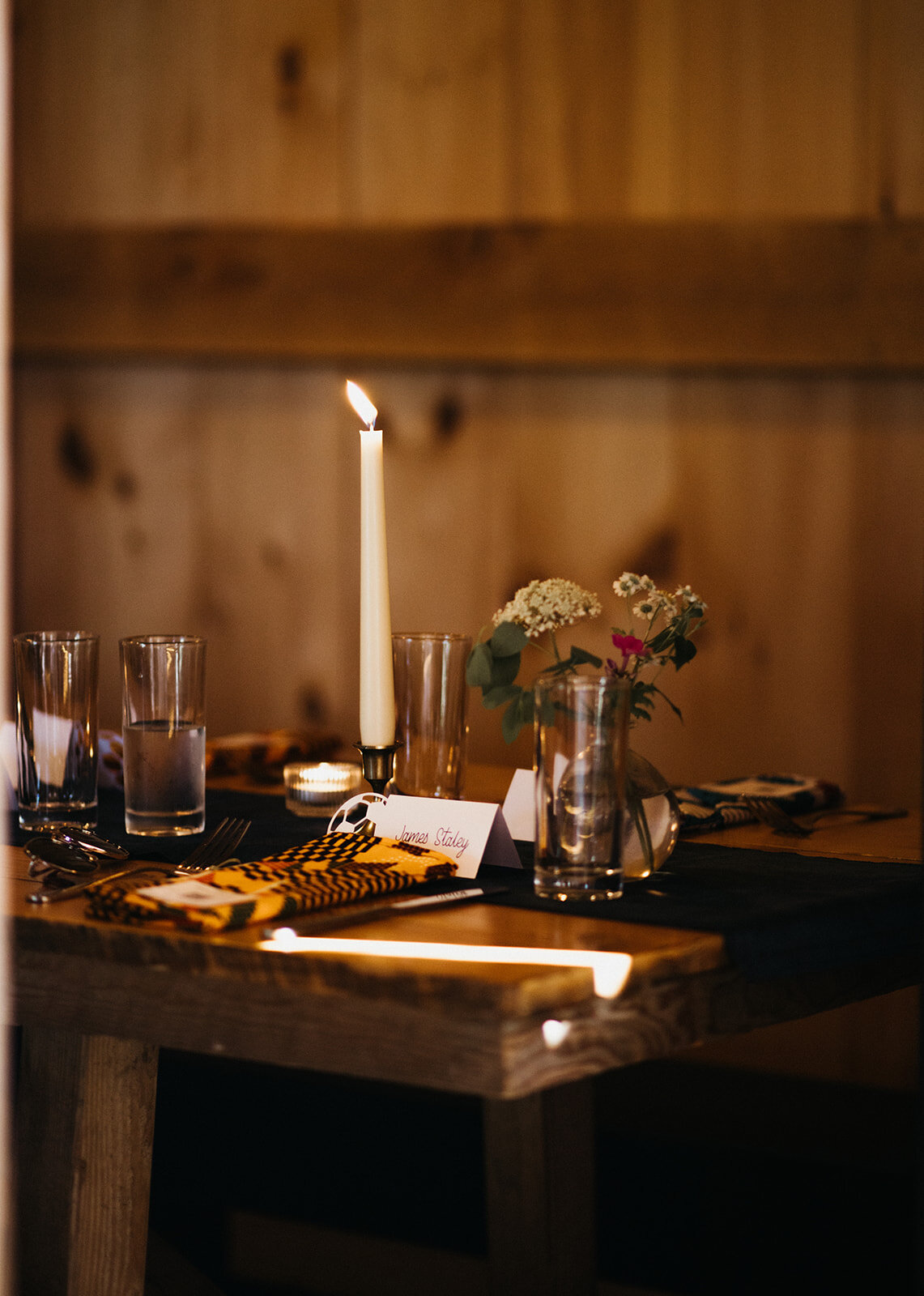 Maine wedding tablescape with lit candle