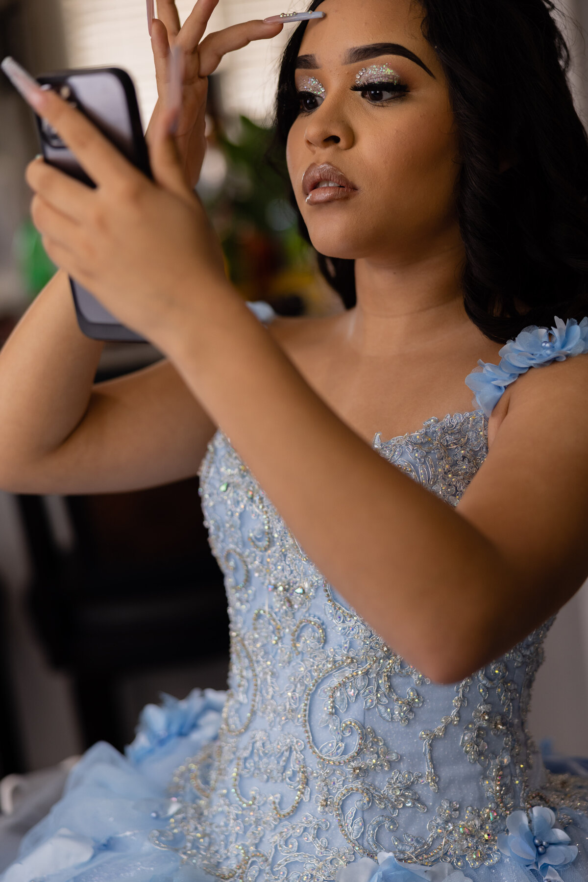 We specialize in capturing beautiful and authentic Quinceañera photos throughout Northeast Ohio. Victoria's recent celebration included getting ready at home, stunning portraits at University Circle, and a lively reception at the Parma Astrodome. Contact us to book your Quinceañera photography today!