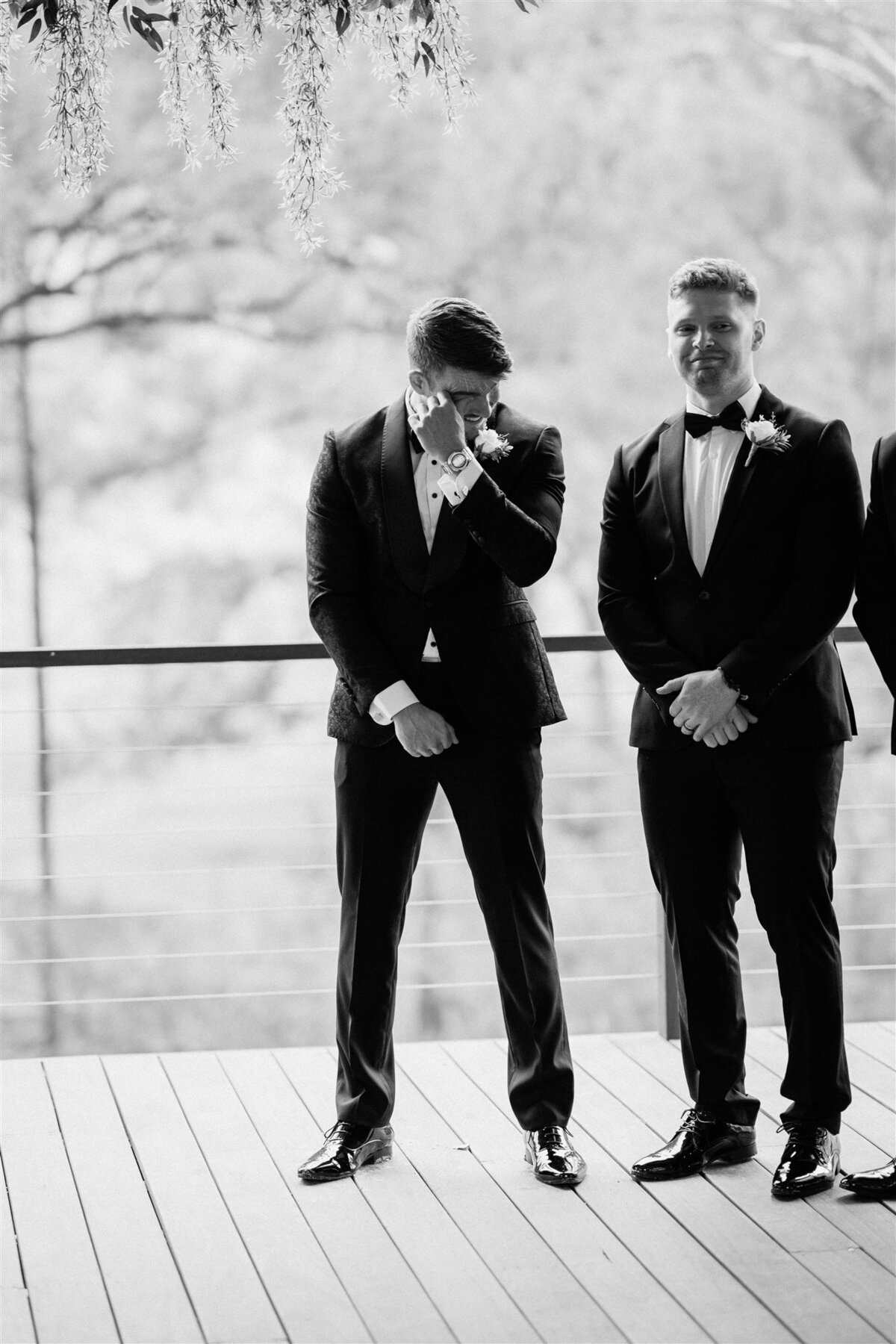 The groom was overcome with emotion at the ceremony as he watched his bride walk down the aisle.