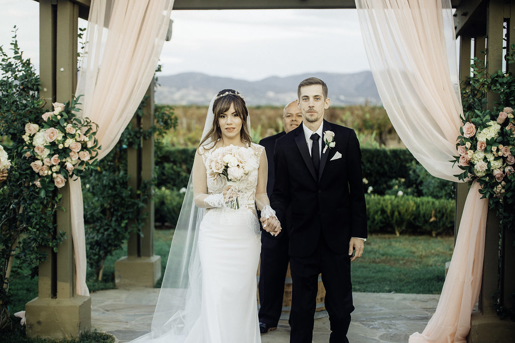 Wedding Photograph Of Bride And Groom Holding Hands Los Angeles