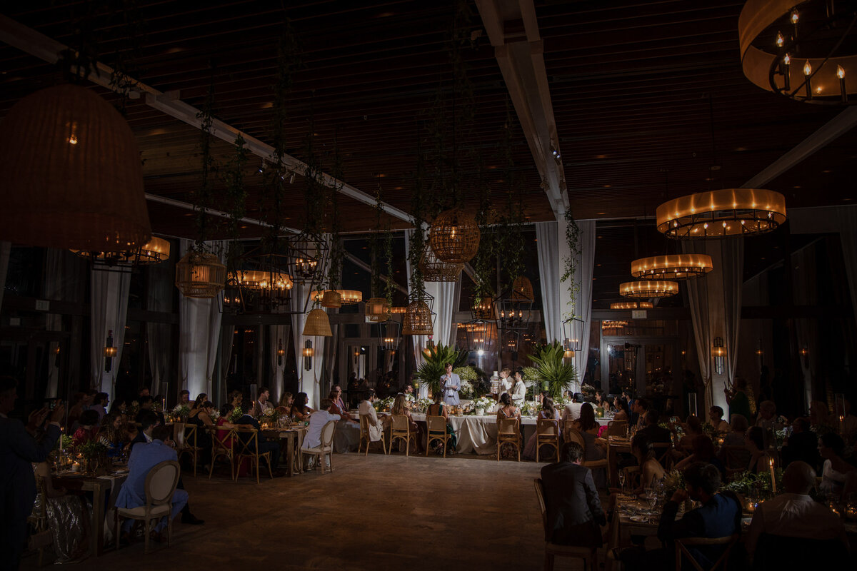 A dramatic nighttime indoor reception  at a destination wedding in Puerto Rico