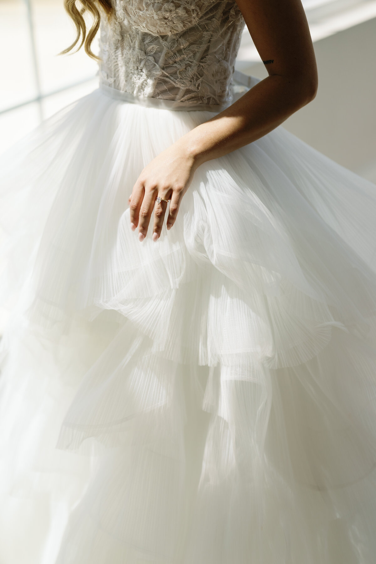 Bridal portrait of wedding gown and ring