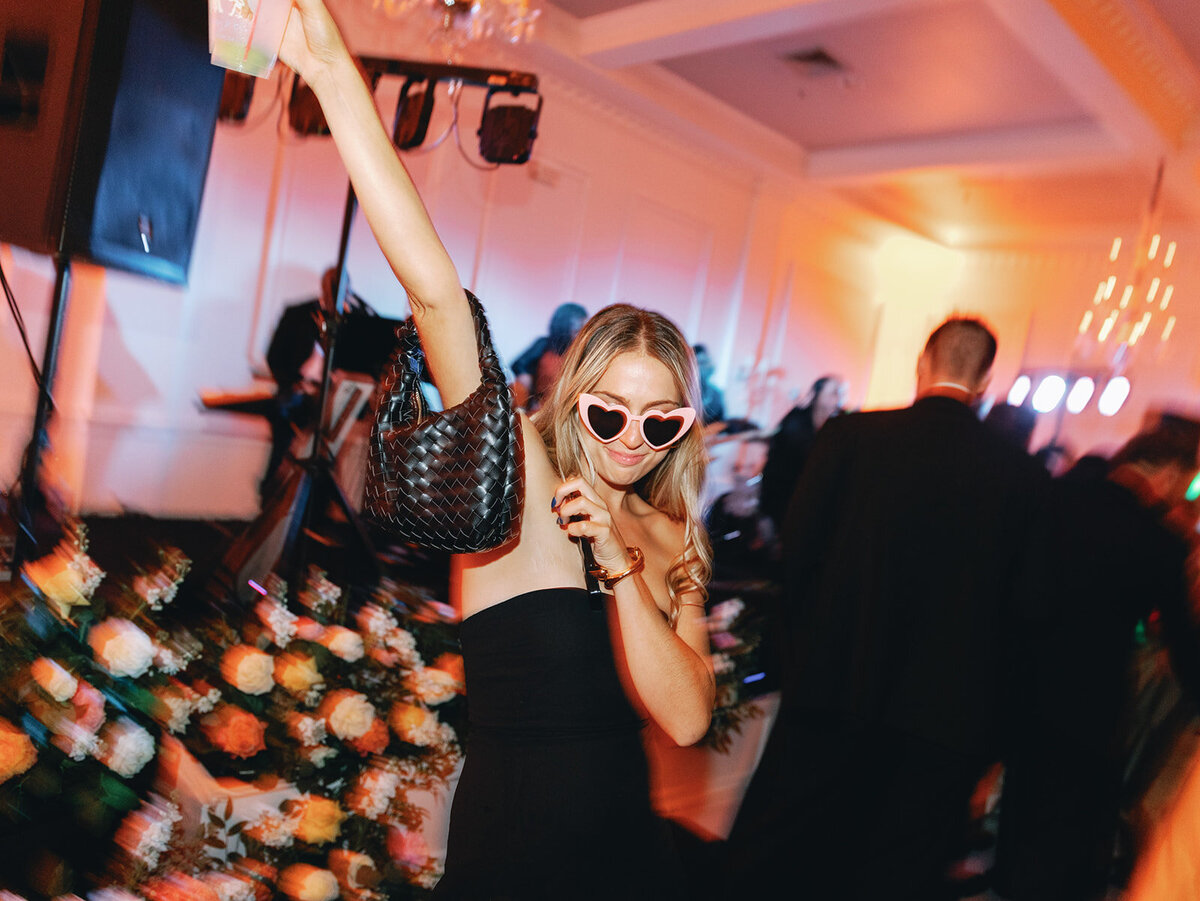 wedding guest dancing at reception