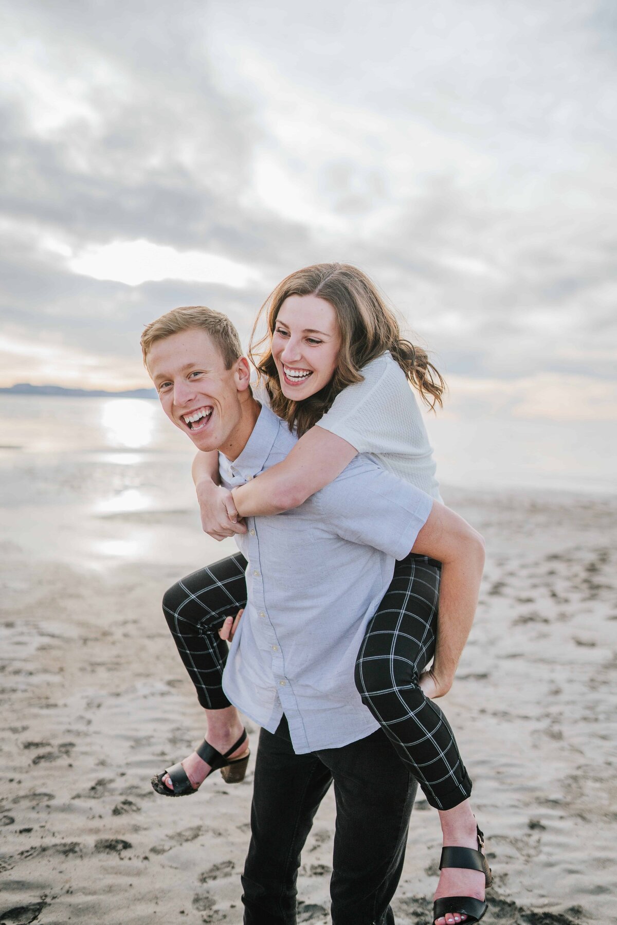 Sacramento Wedding Photographers capture woman on man's back