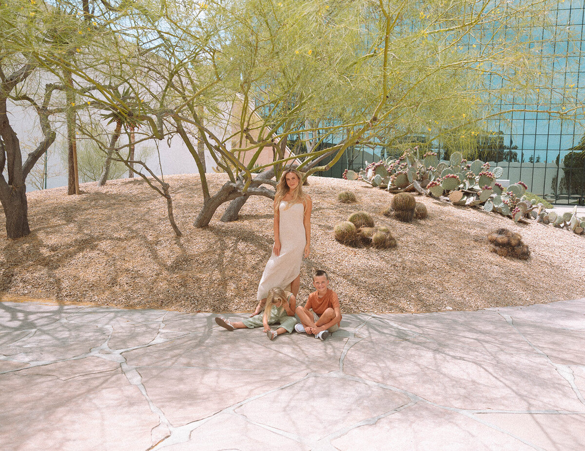 Editorial family portrait surrounded by desert plants and modern architecture at Noguchi Garden, Costa Mesa.
