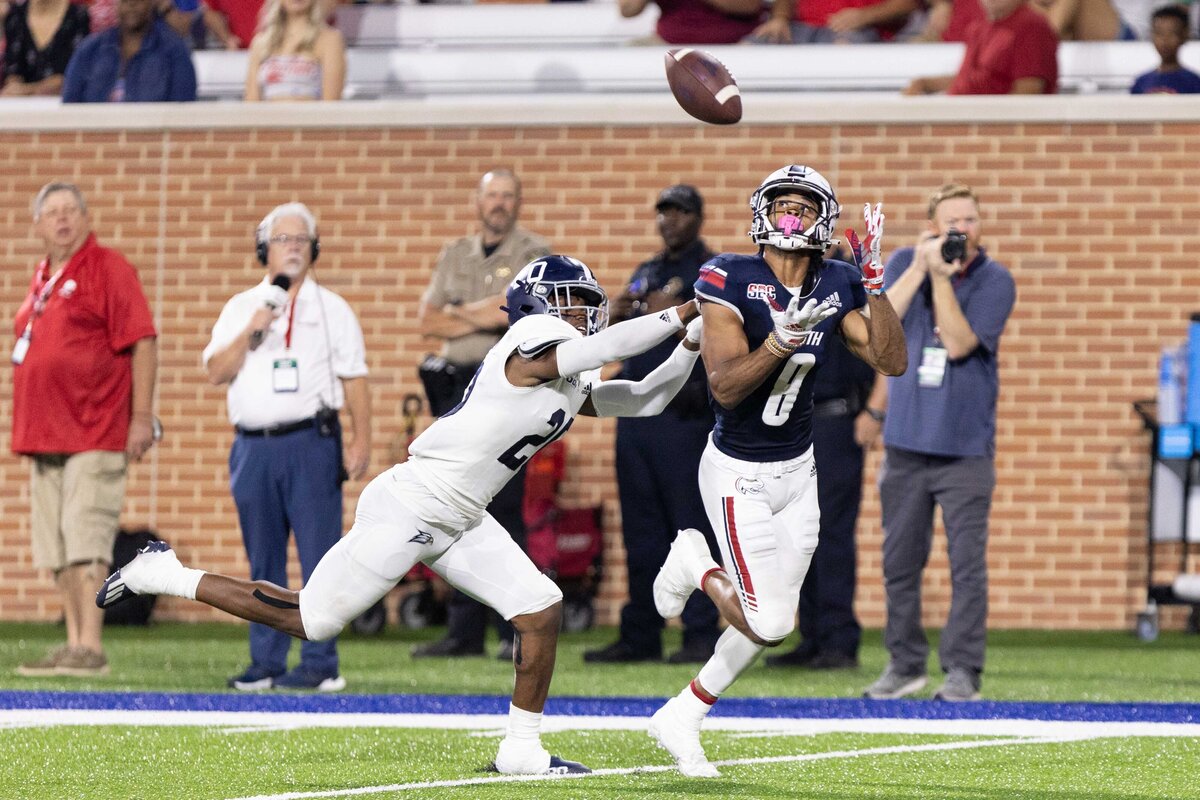 Jason Tolbert of the University of South Alabama catches a pass for a touchdown.