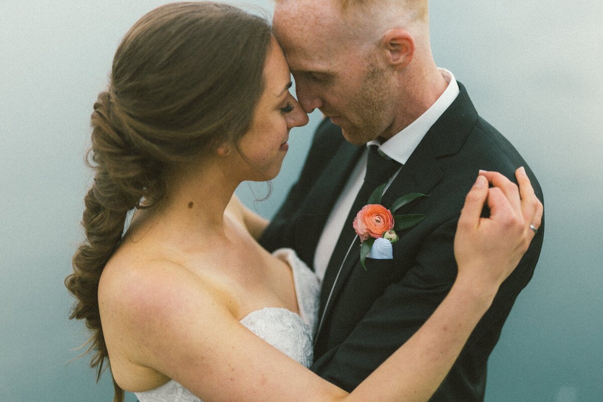bride and groom hold each other close during their Newfoundland elopement