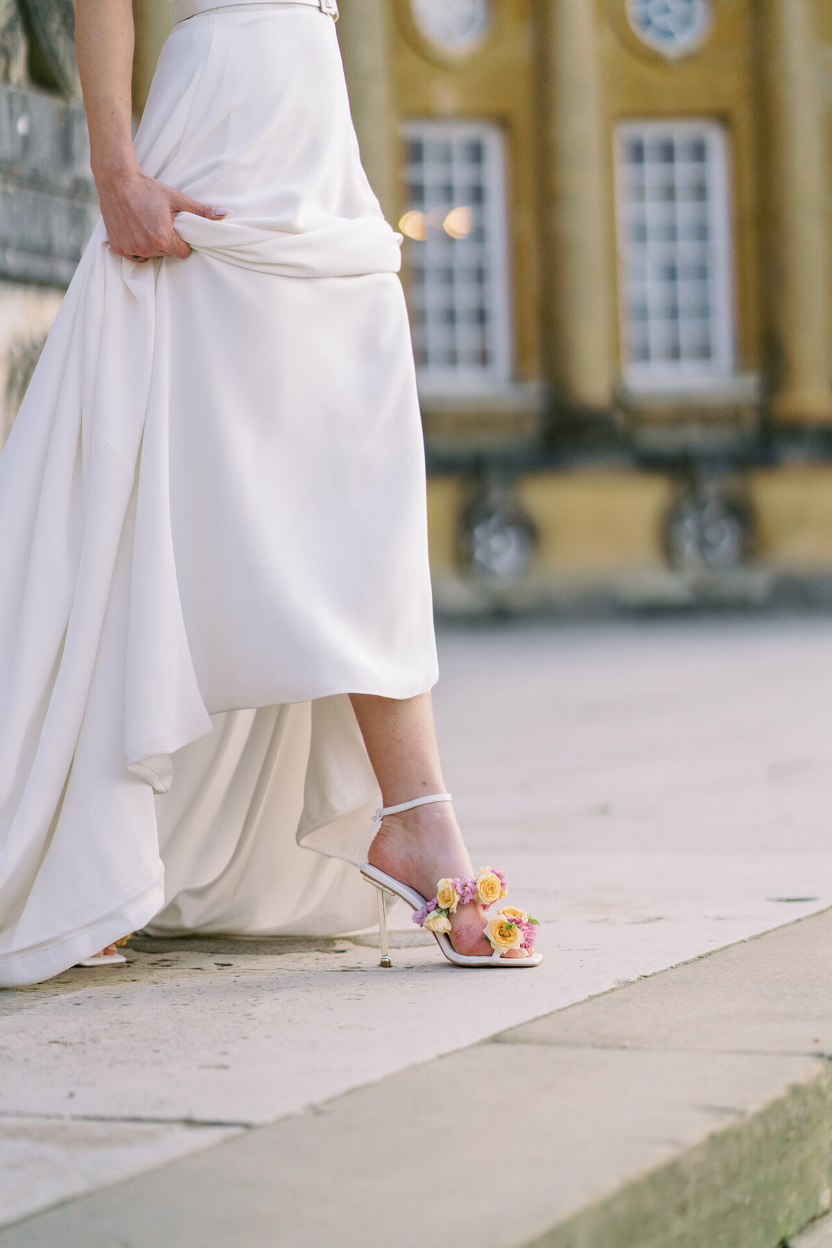 bride wearing a floral shoe detail