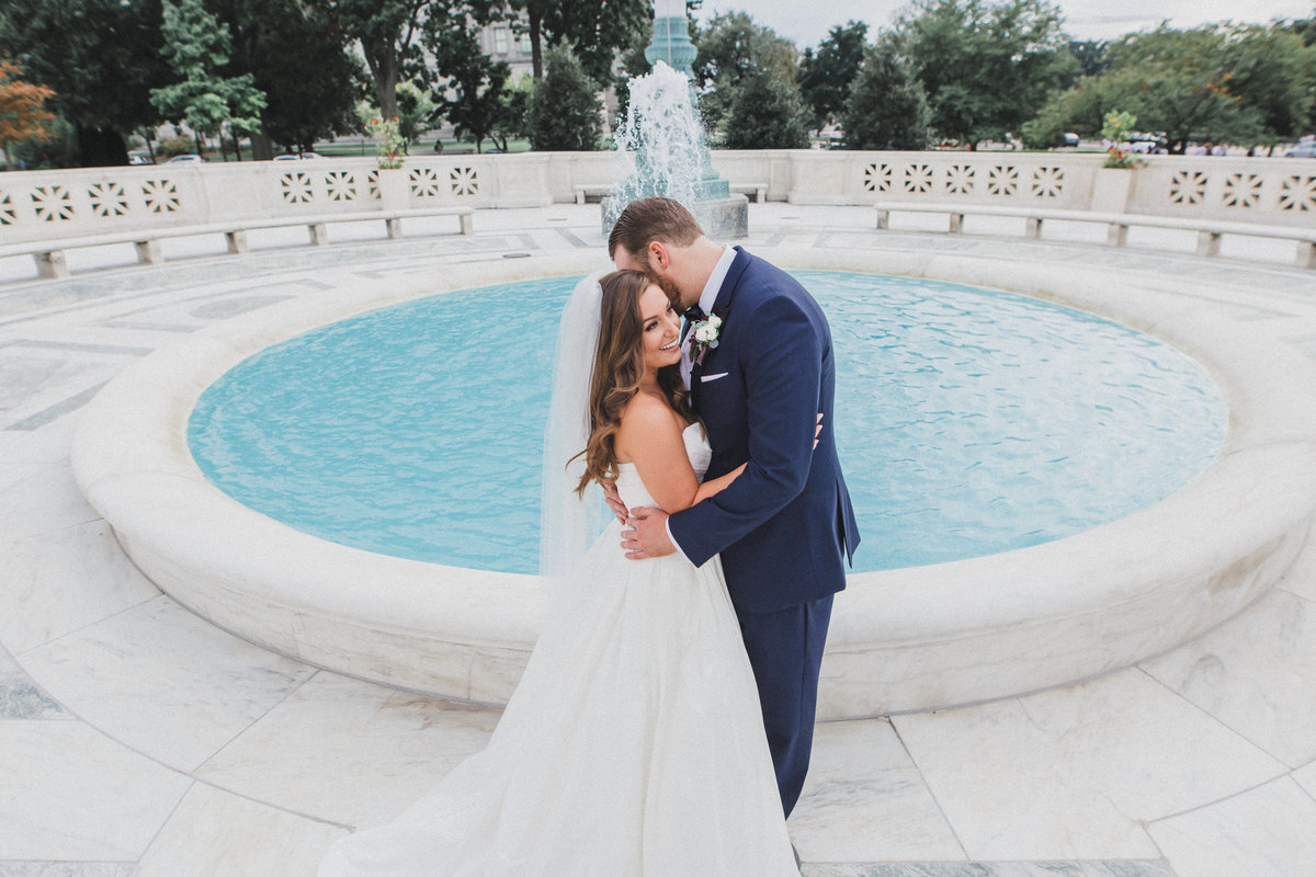 M Harris Studio - Bride and groom in front of fountain DC