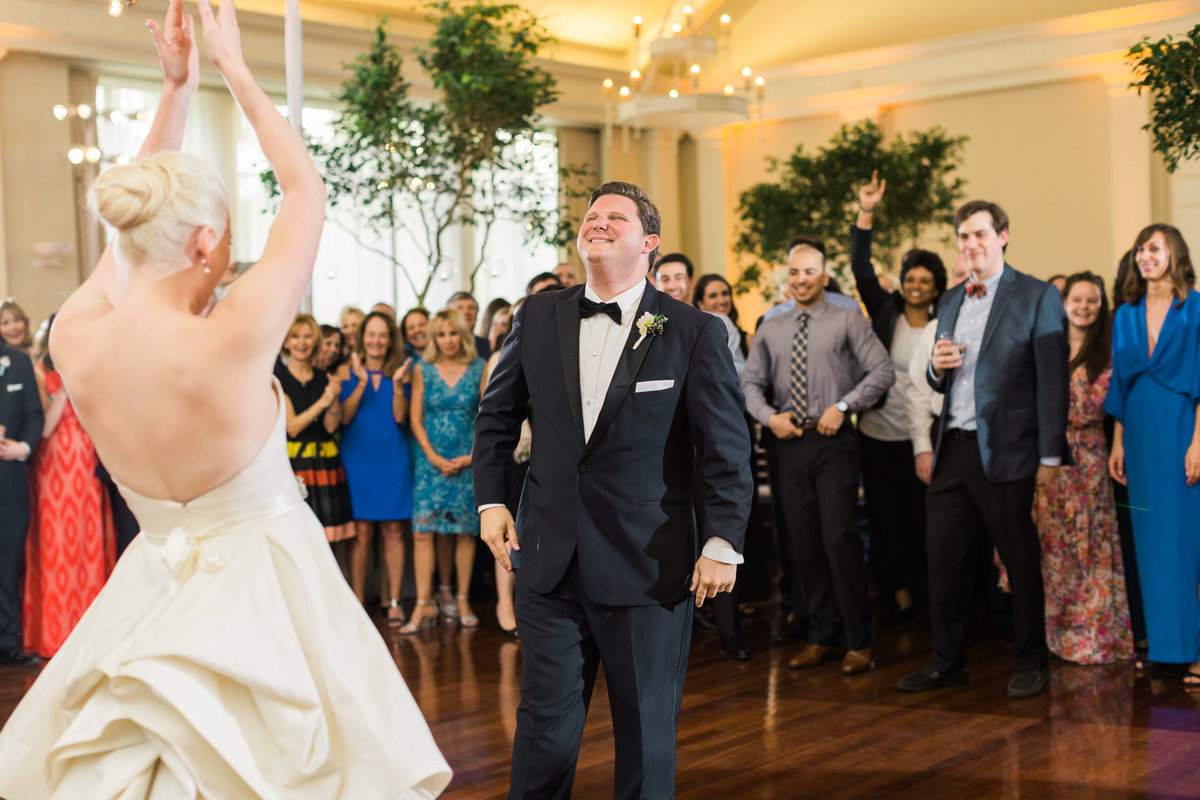 Brett and Mallory's first dance was full of fun and spunk! Photo by luxury destination wedding photographer Rebecca Cerasani.