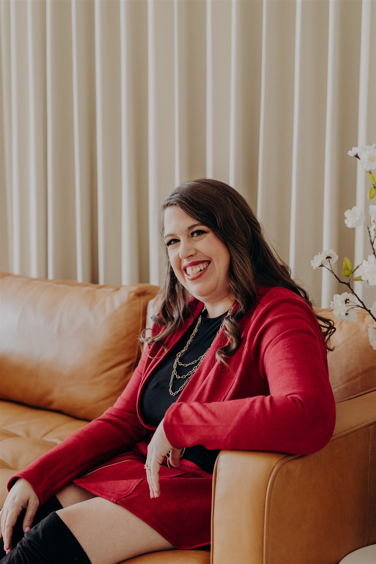 marriage counselor sitting in chair holding a book called come as you are