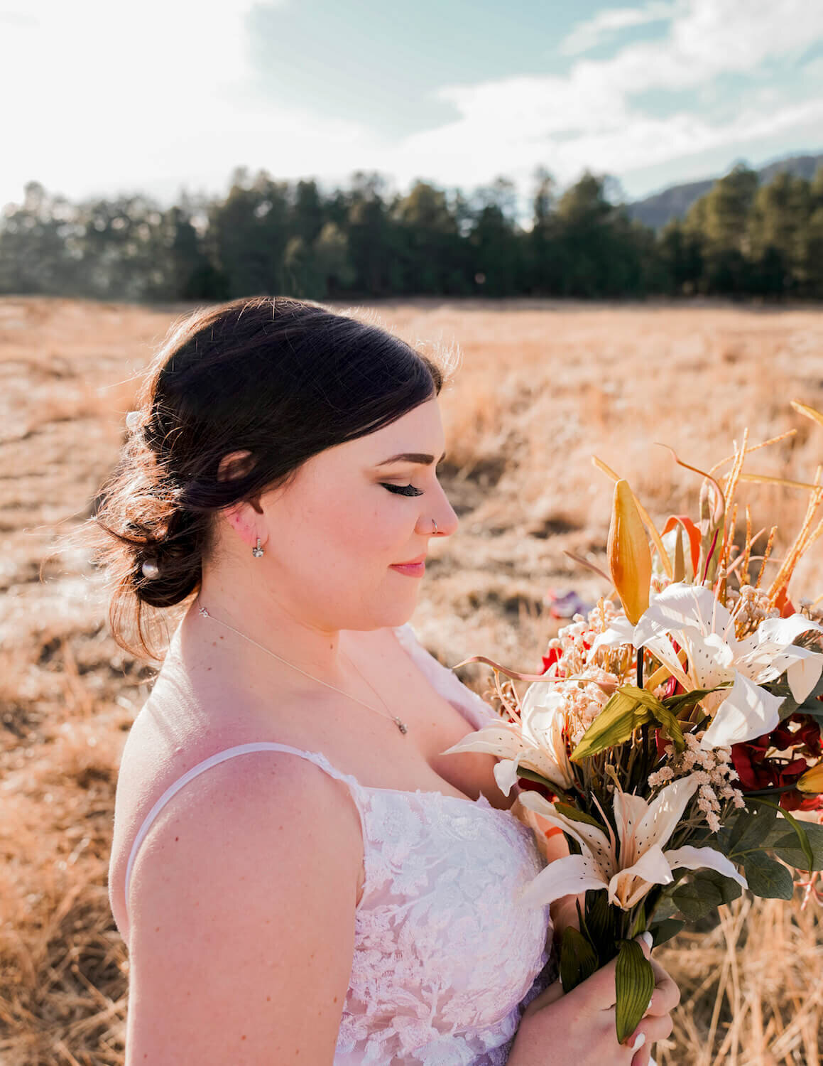 wedding_photography_denver_colorado_-_bride_smiling_and_holding_flowers2