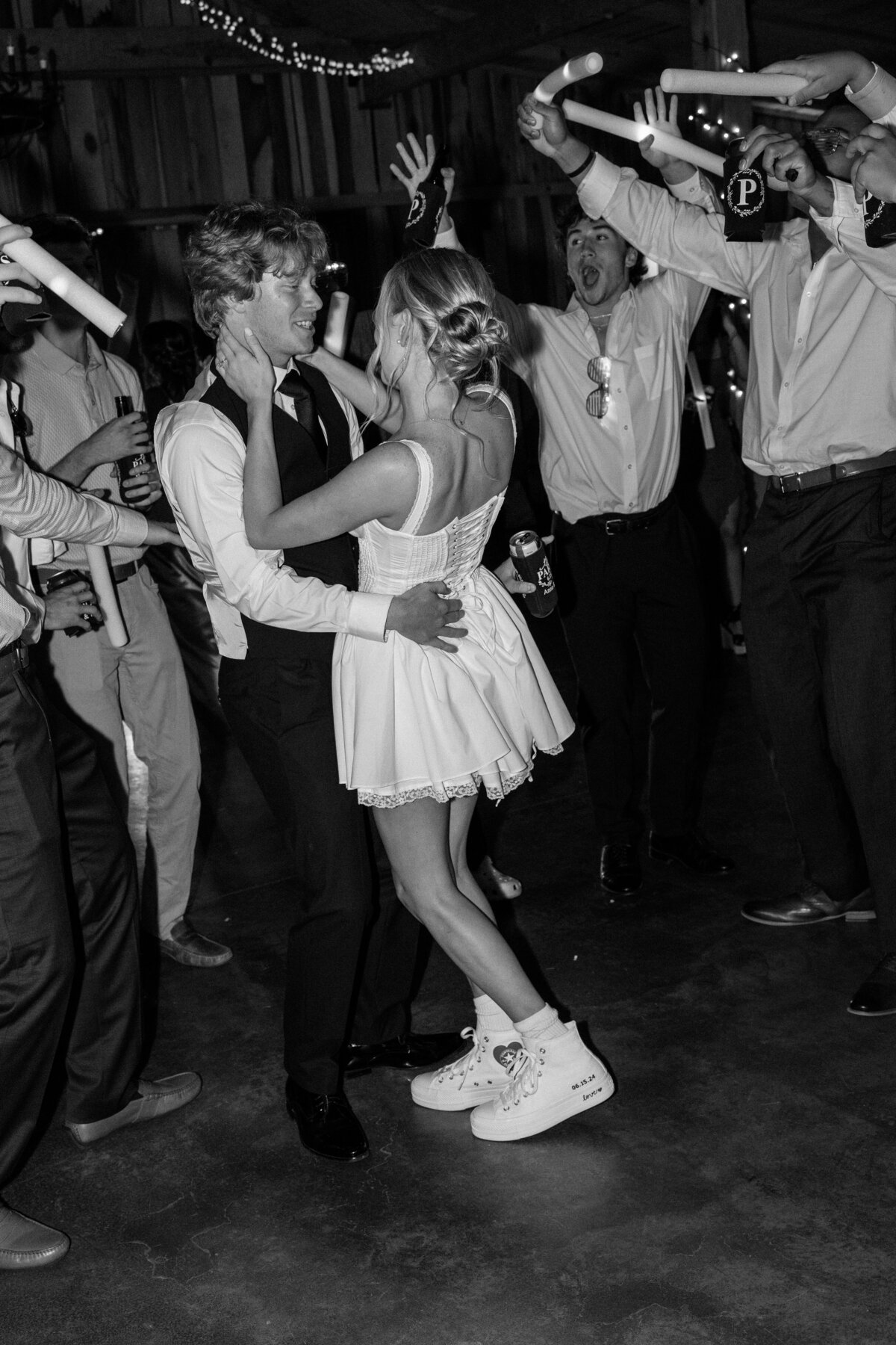 Bride and groom dance together during reception, the bride has changed into a second dress