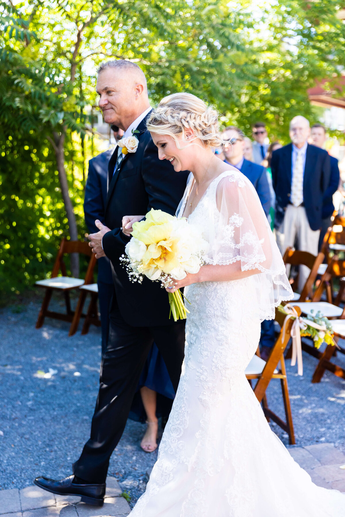 Bride and groom walking down the aisle at Fat Bottom Brewery wedding in Nashville, TN