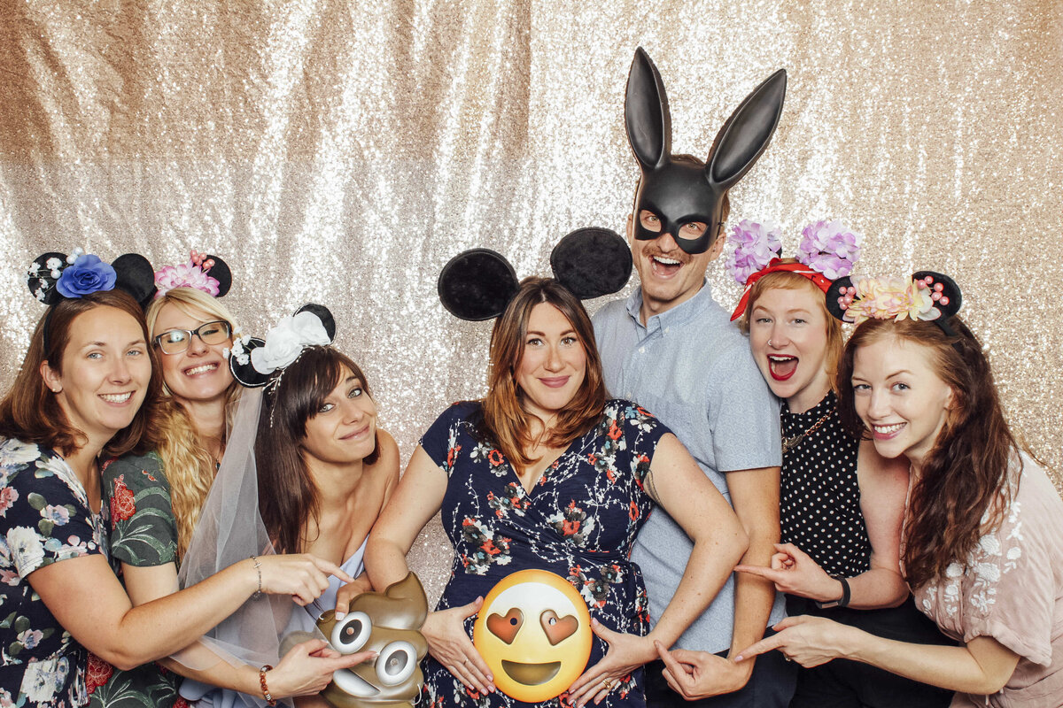 Baby Shower Photographer | Mom-to-be surrounded by guests during baby shower celebration | Mercer County, New Jersey