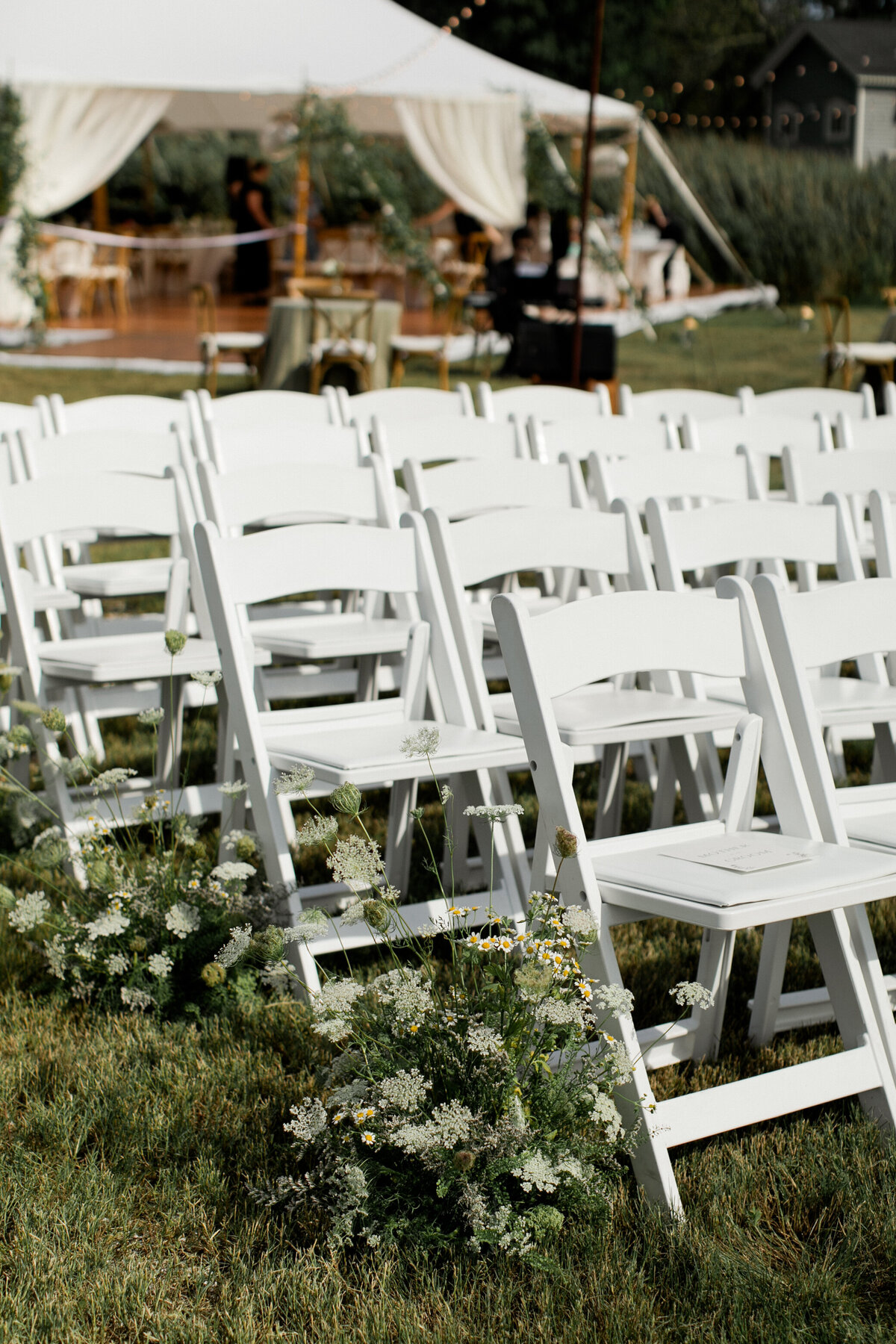 outdoor-waterfront-wedding-ceremony-garden-chairs-ct-wedding-planner