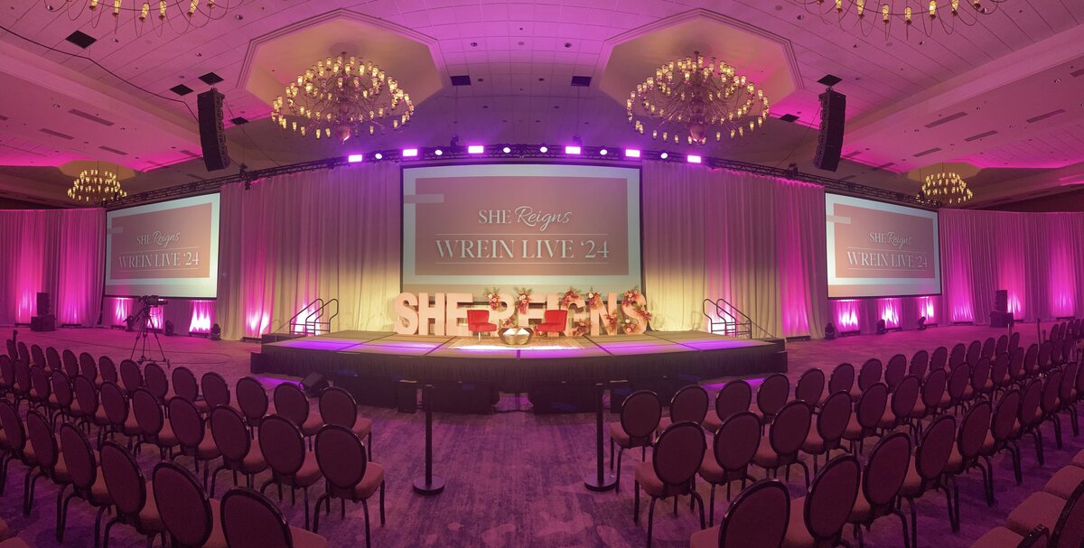 indoor corporate event with stage