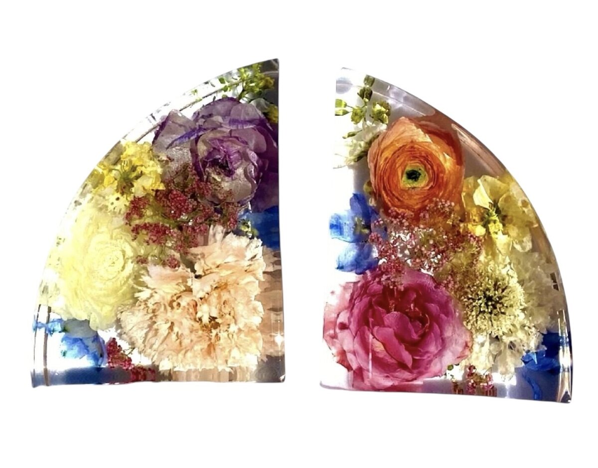 bookend resin block with purple peach cream orange blue and pink wedding bouquet preserved as a family heirloom