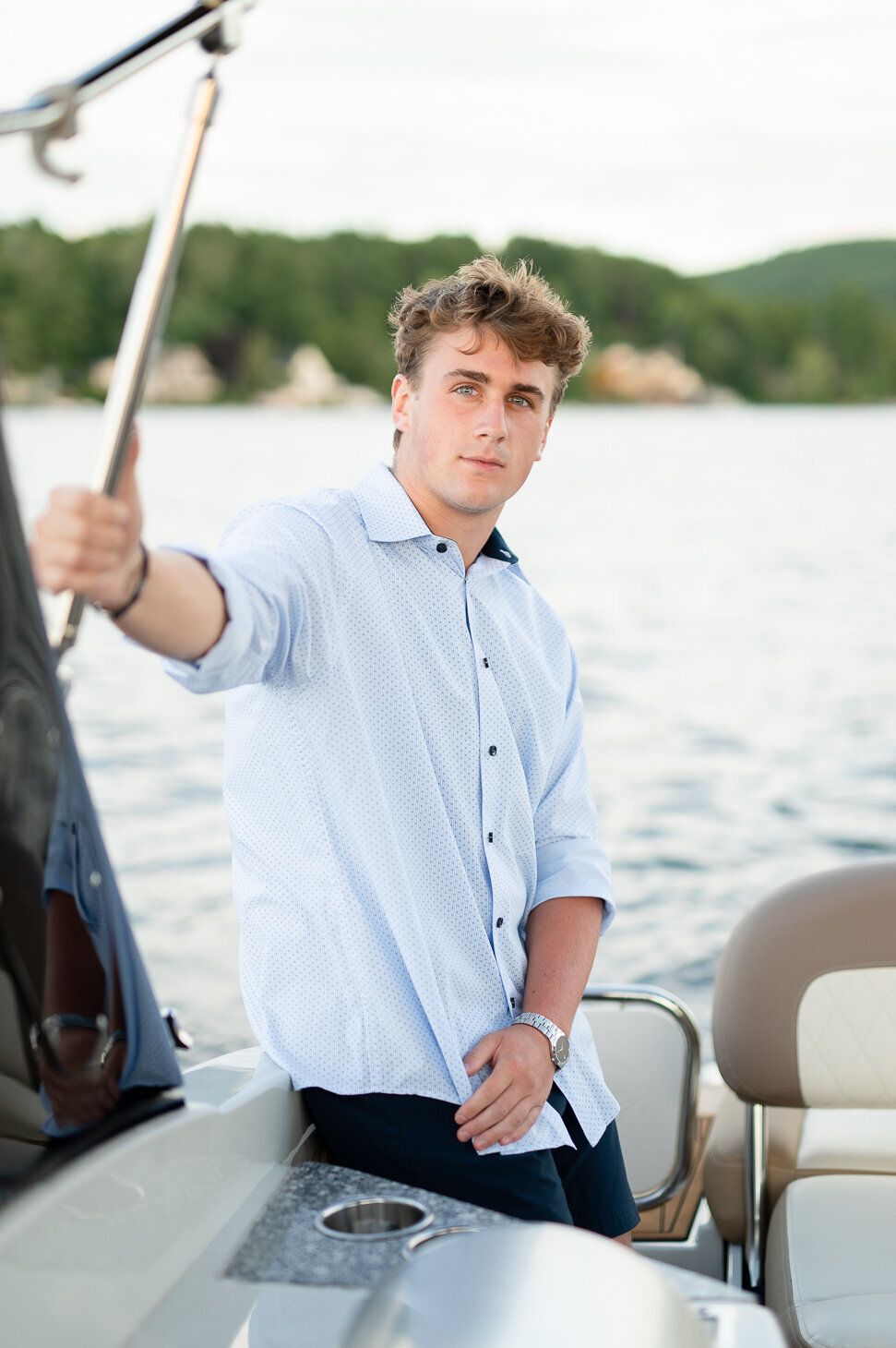 Senior portrait session on a boat in Lake Winnipesaukee, NH. 