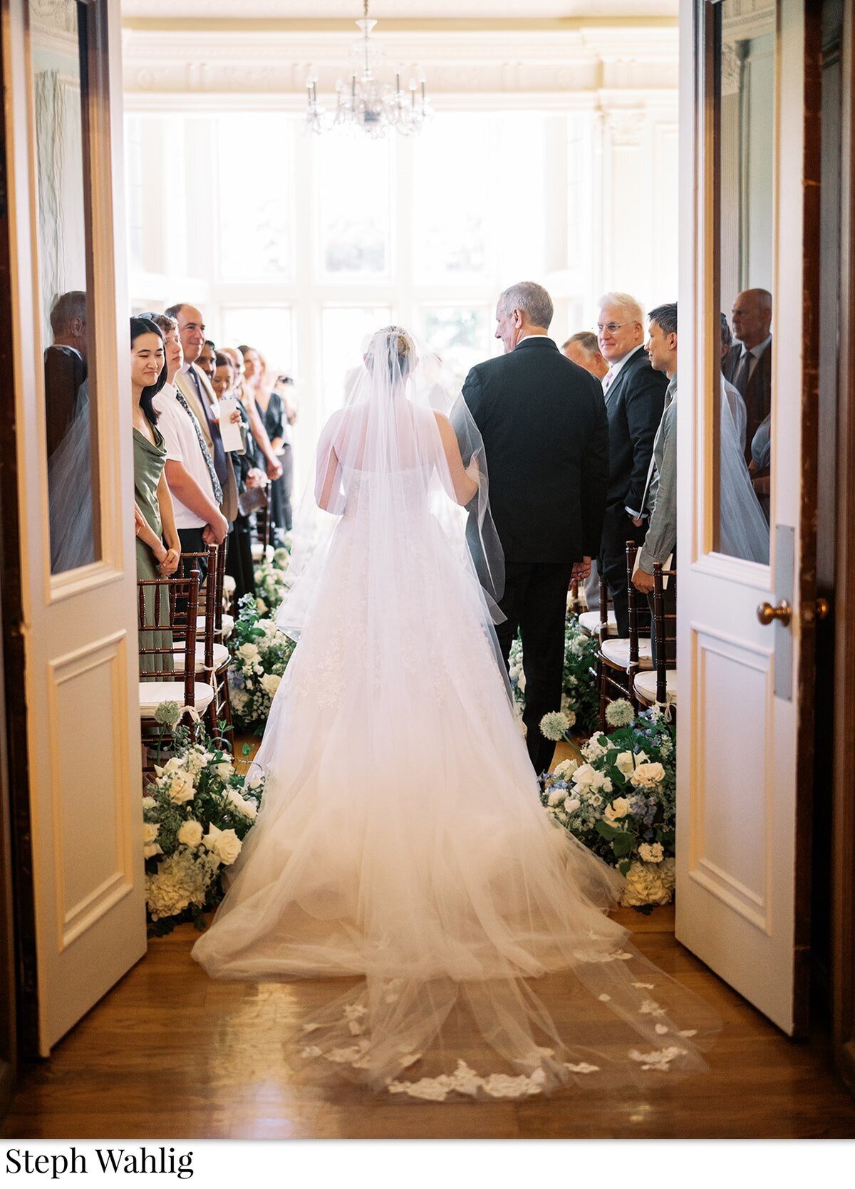 Bride and groom, wedding dress, father, daughter, aisle, ceremony, double doors, indoor ceremony