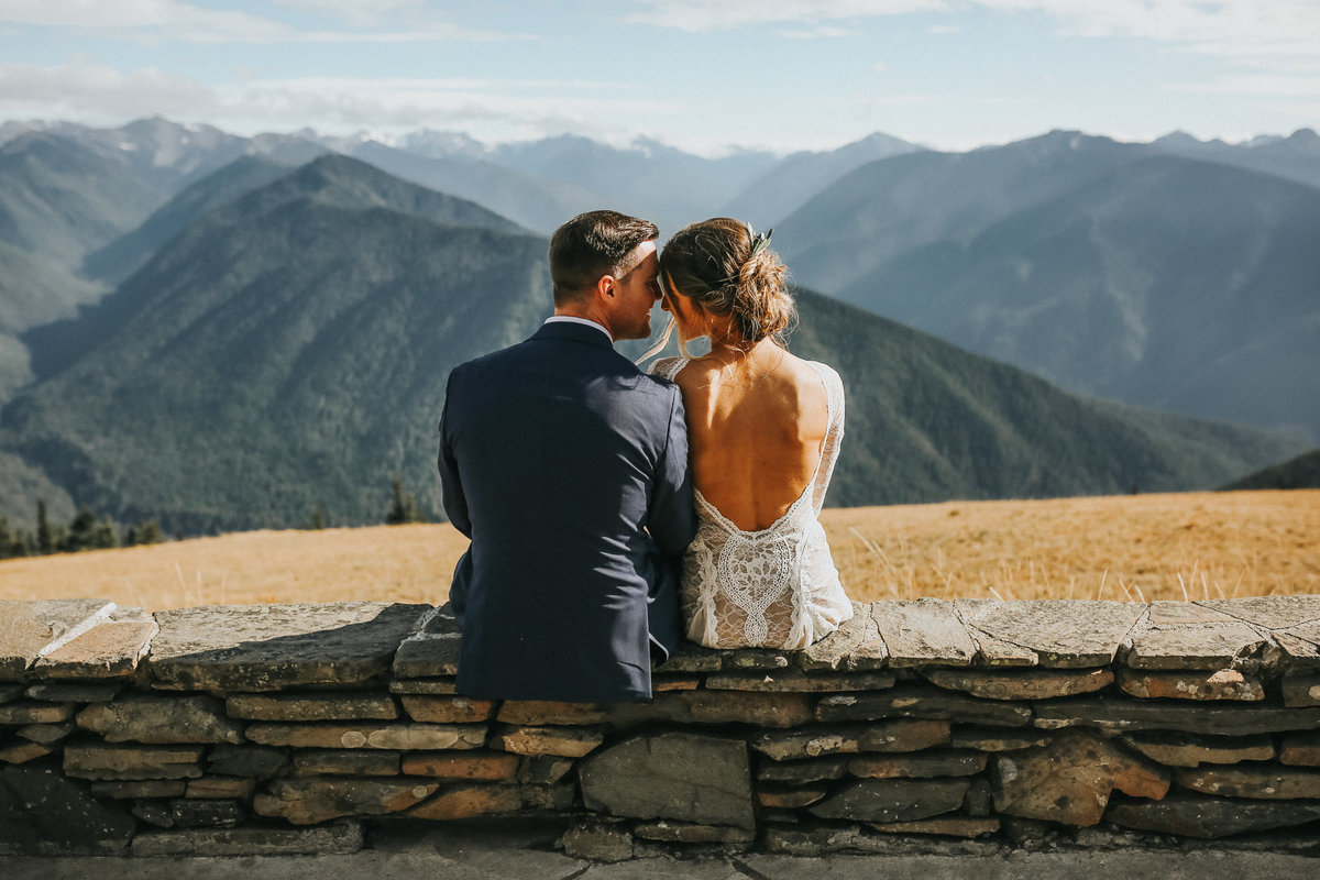 Hurricane Ridge elopement with bride and groom portrait with mountains in the background.