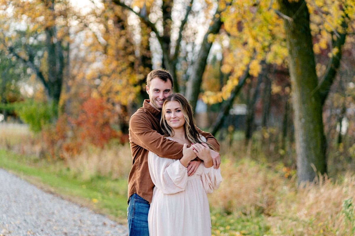 couple-bride-groom-to-be-smiling-fall-session