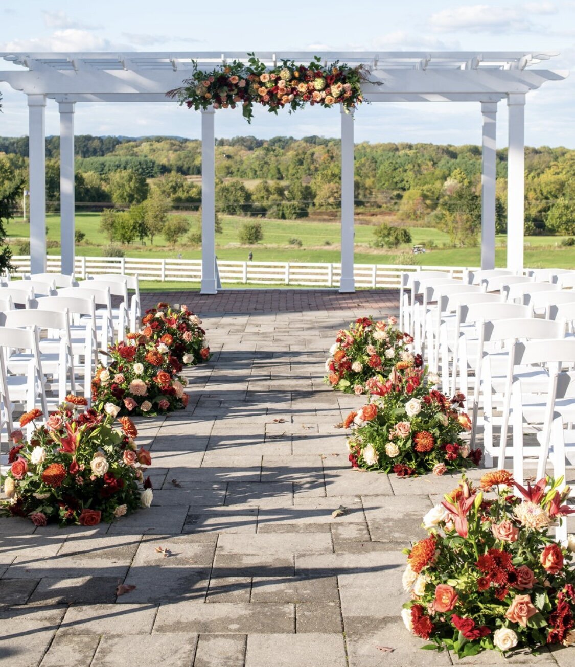 Unqiue ways to decorate your ceremony aisle. Customized wedding flowers. Wedding florist in Easton, MD and Chestertown, MD.