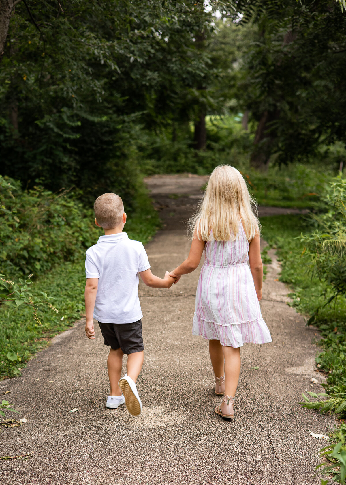 Image of Brother and Sister Holding Hands
