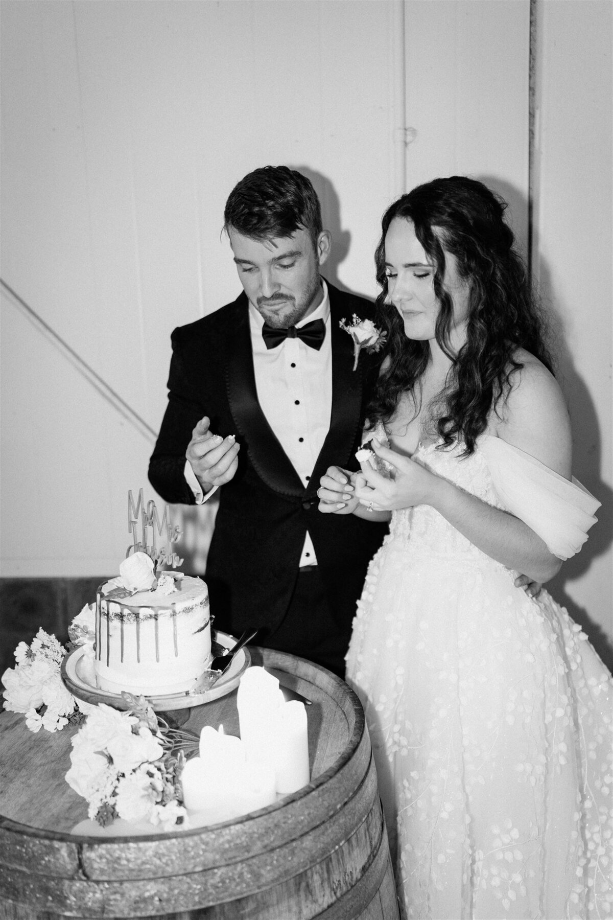A charming moment captured as the couple shares a joyous dance amidst their wedding reception festivities.
