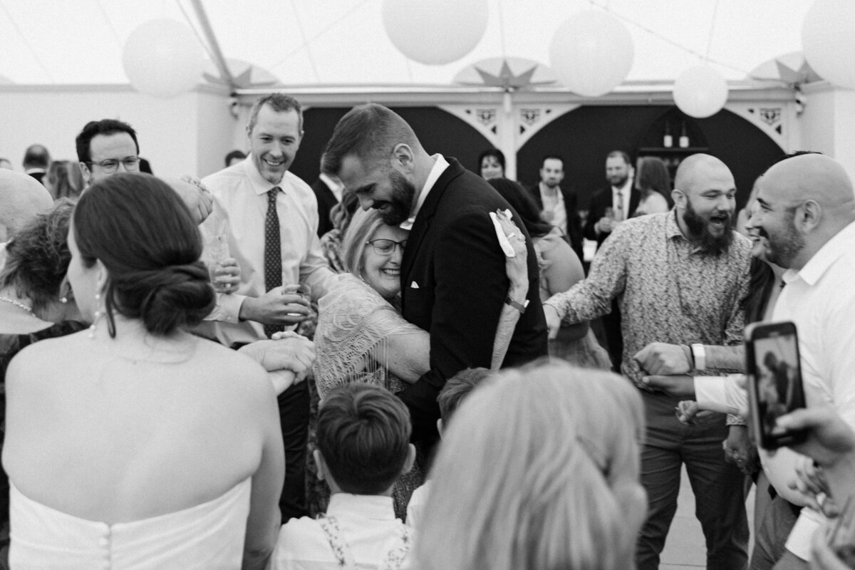 Wedding guests chatting together at Finger Lakes wedding, NY