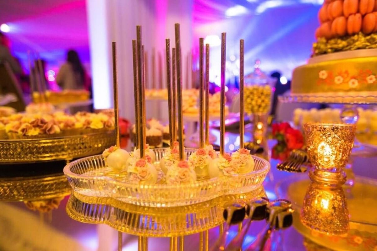 Delicious cake pops on a glass plate