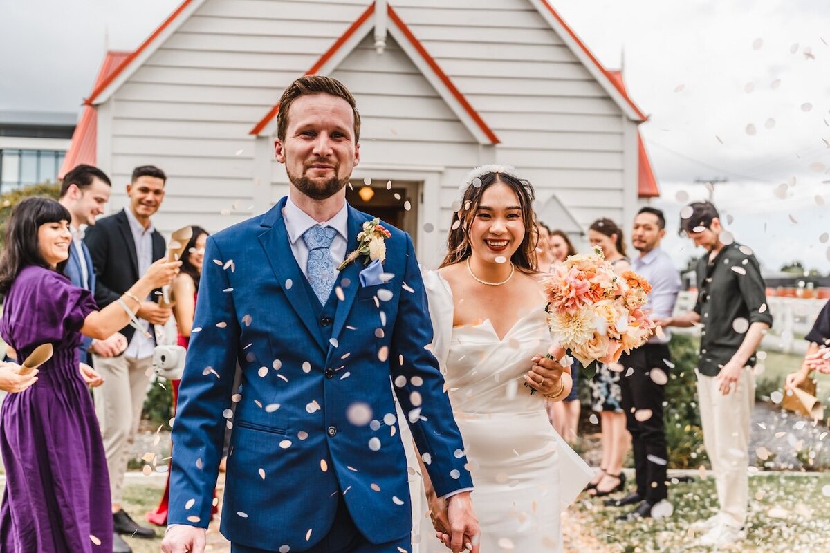Bride and groom celebrating ismall wedding NZ