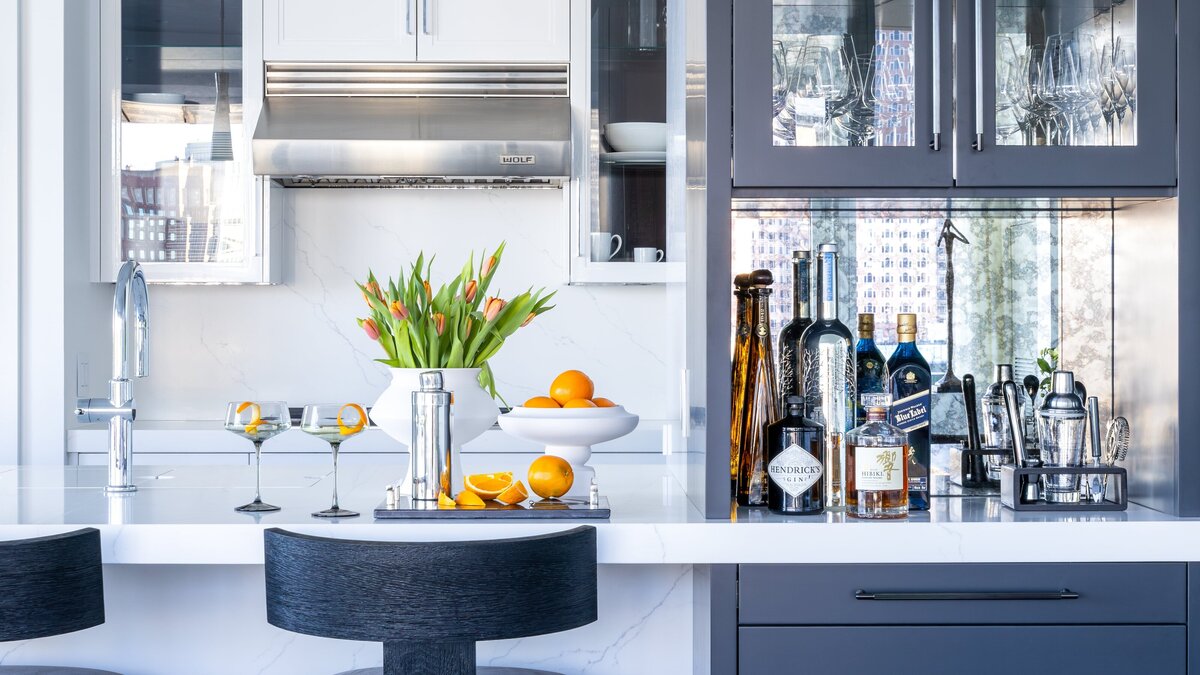 Modern kitchen with integrated home bar in Seaport condo, Boston