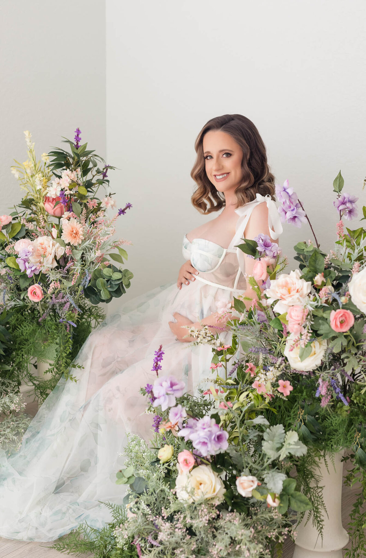 studio floral photoshoot for pregnancy