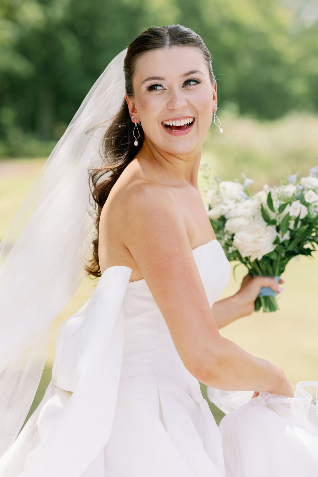 Athens bride with glowing skin, soft curls, and classic bridal makeup by Kayla Walters Beauty Collective.