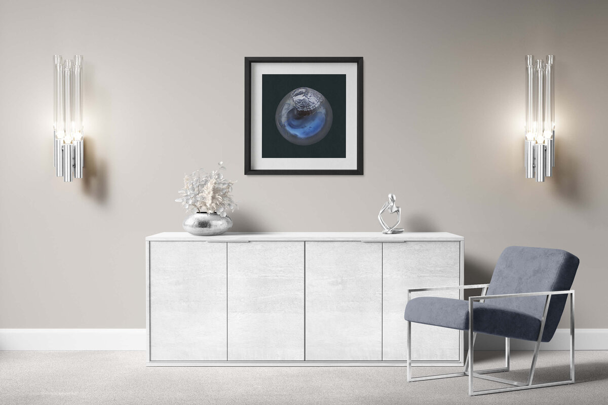 Fine art photo print with a black wooden frame featuring Project Stardust micrometeorite NMM 2752