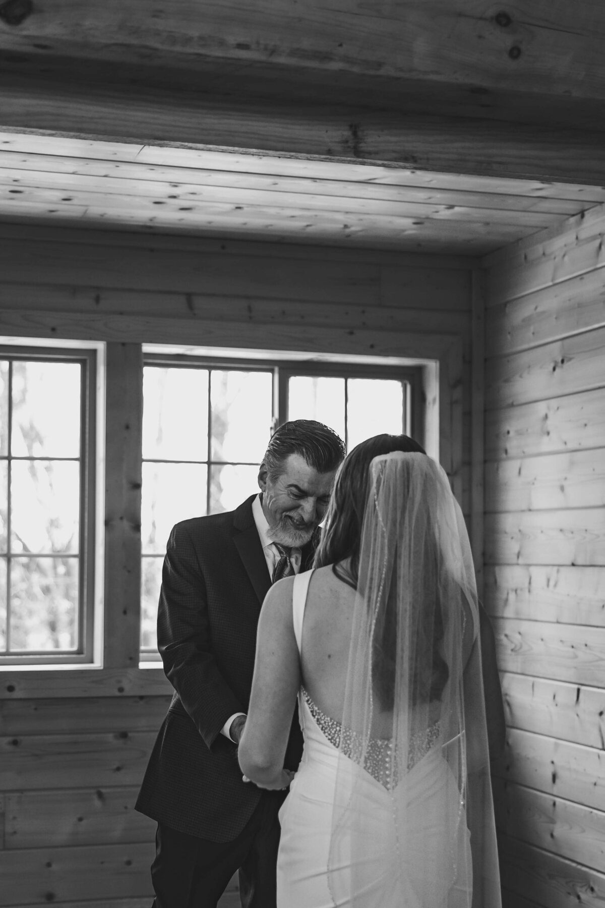 Sentimental moment between father and daughter first look at wedding venue in Missouri