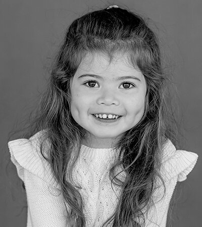 Black and white image of a girl in Port Coquitlam when I came to her school for back to school photo day.