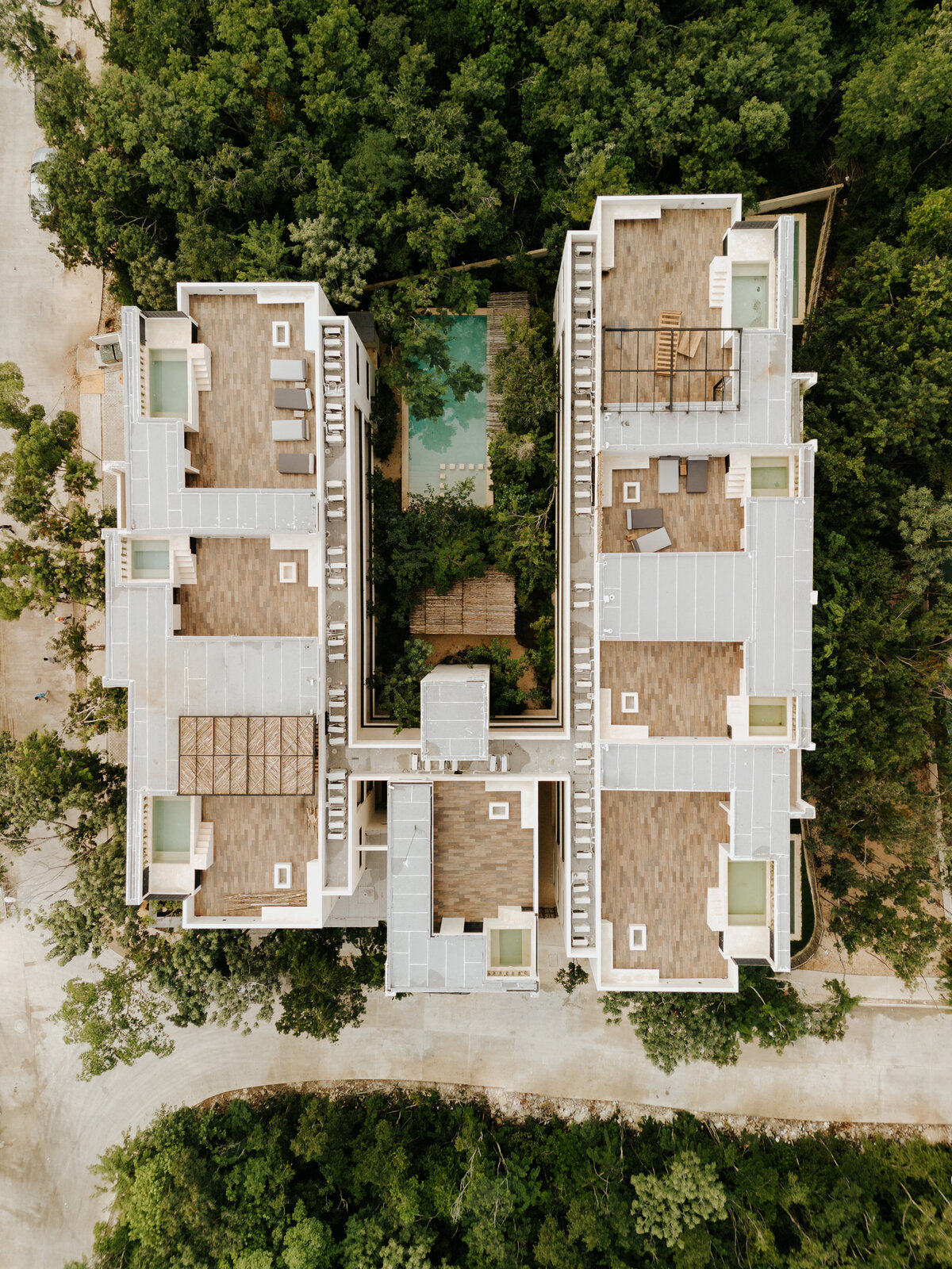 arial-view-property-condo-bulding-tropical-trees