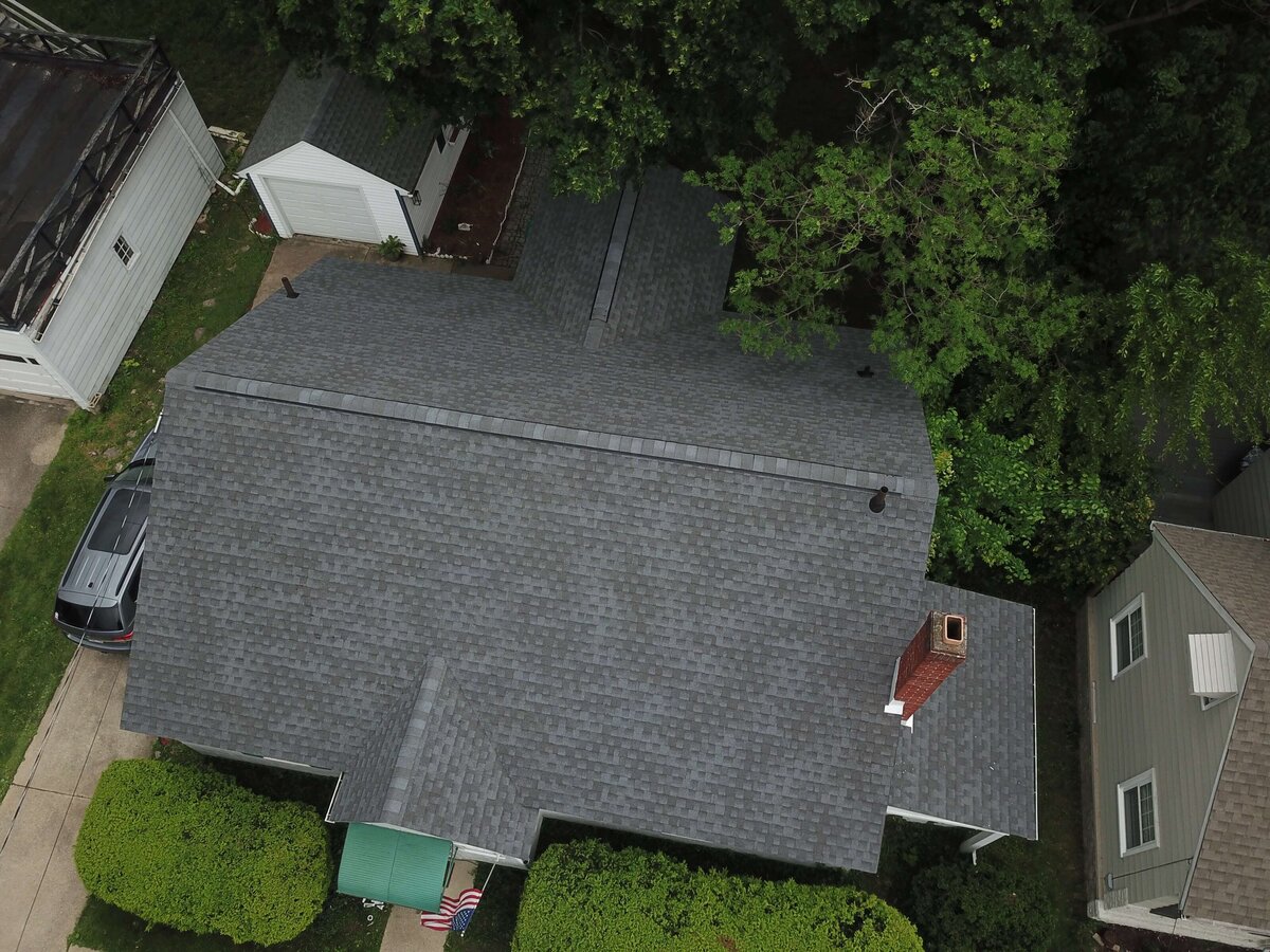 Aerial view of a completed residential roof installation by Black Bear Roofing.