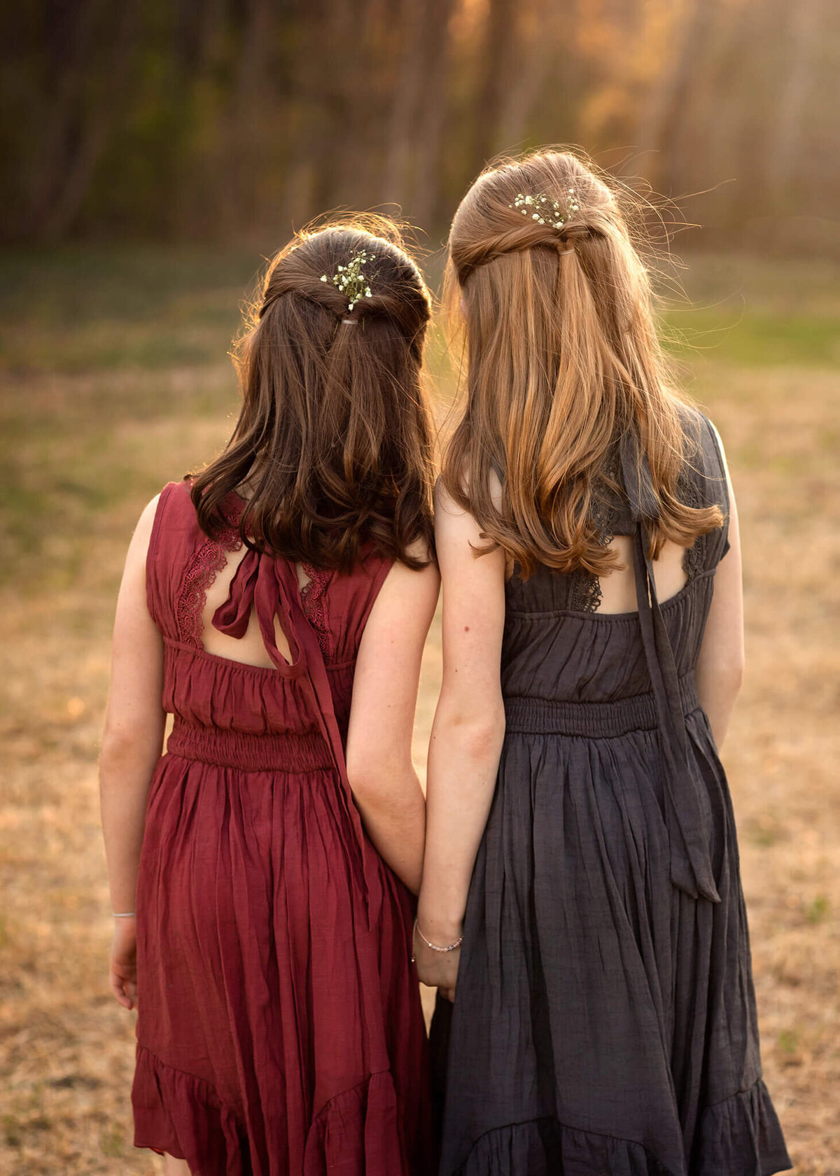 NJ portrait photographer captures daughters with beautiful dresses holding hands