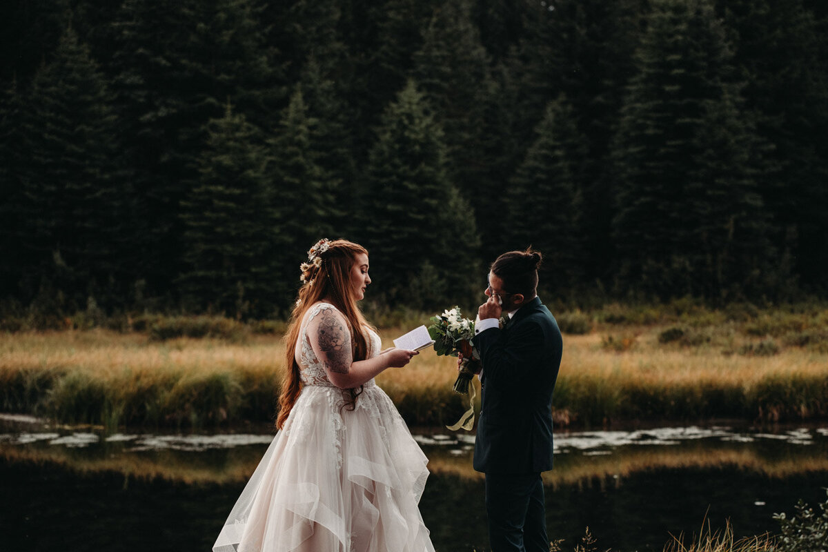 Shaelyn and Shane recite vows privately in front of forest in Wyoming