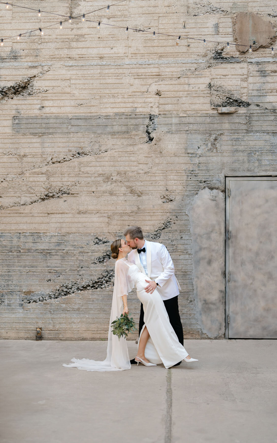 Artistic wedding photo created in a historic warehouse venue in Phoenix.