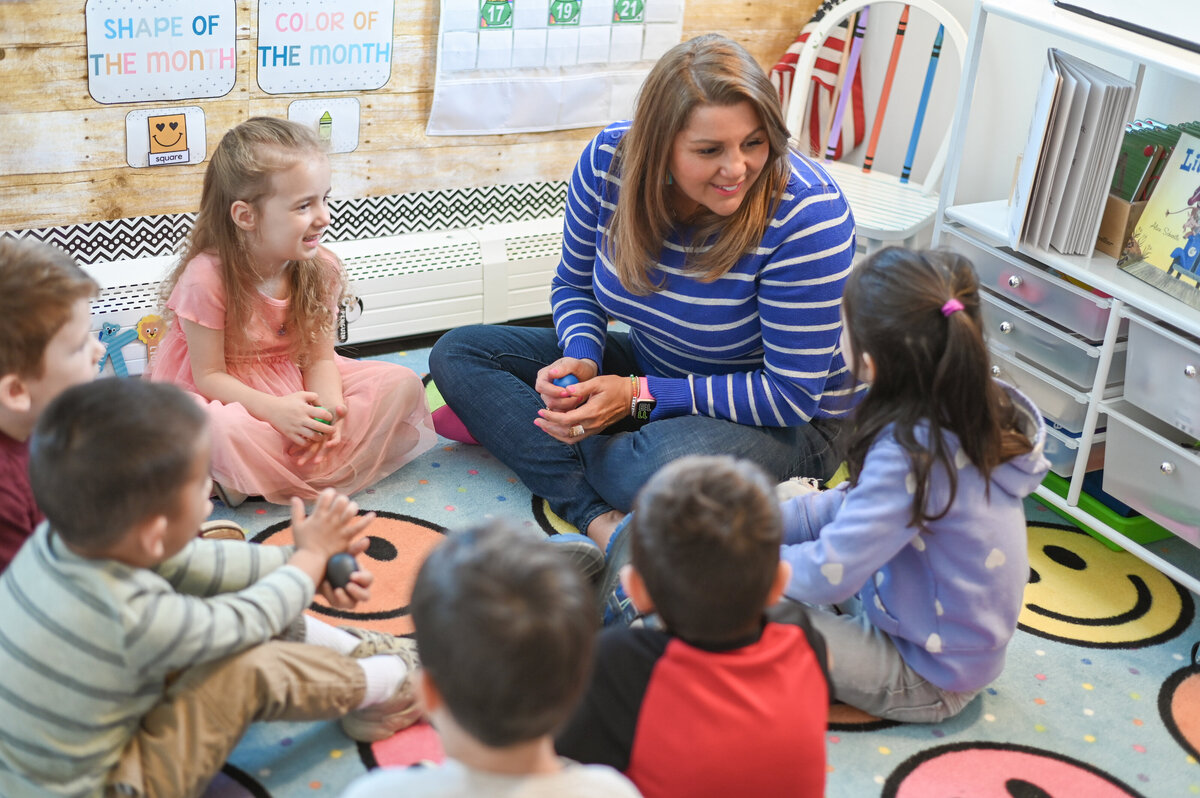 Mrs.Hanscome leading circle time with students at House of Parker Preschool Gorham Maine