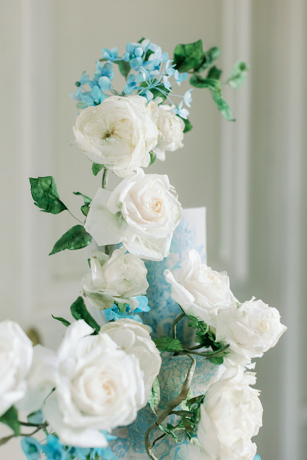 Destination Wedding Photographer in Stockholm helloalora Anna Lundgren Chateau de Courtomer castle wedding in Normandy France blue and white wedding cake by monika kos sweets