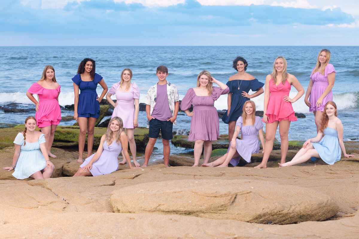 Beach portraits for this Raleigh Model Team at Ft. Fisher at low tide with the moss covered rocks.