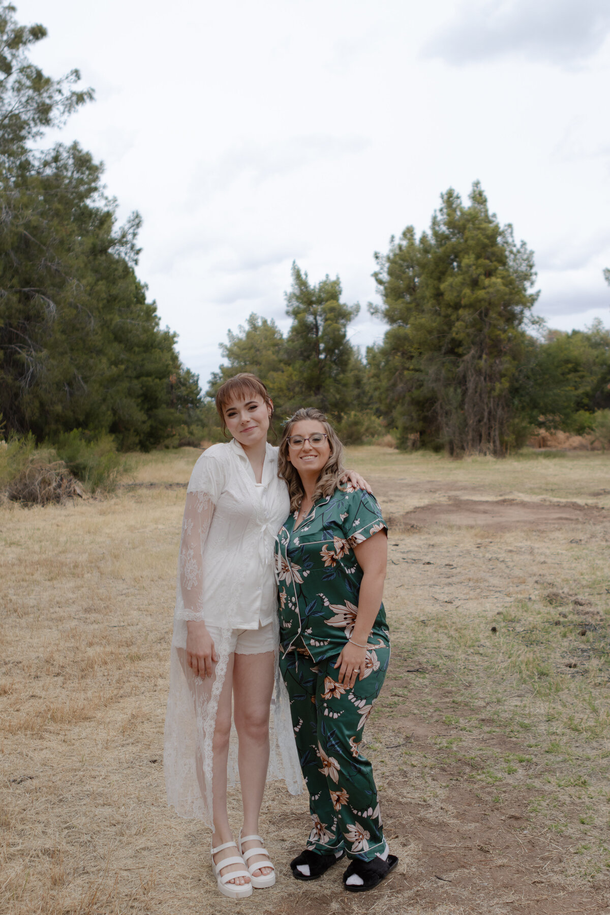 Jovanna G Photography. Classic, sophisticated Wedding Photos. Soft romantic engagement photos. Soft romantic WeddingPhotos. Sophisticated Wedding Photographer. Professional Wedding Photographer. Destination Wedding Photographer. Luxury Wedding photographer. Traveling Wedding Photographer. AZ Wedding Photographer. Gilbert AZ Wedding Photographer. Queen Creek Wedding Photographer. Phoenix Wedding Photographer. Scottsdale Wedding Photographer. Flagstaff Wedding Photographer. SoCal Wedding Photographer. California Wedding Photographer. Northern California Wedding Photographer. Southern California Wedding Photographer. San Francisco Wedding Photographer. Bay Area Wedding Photographer. San Jose Wedding Photographer. Golden Gate Bridge Wedding Photographer. Beach Lover Wedding Photographer. Palace of the Fine Arts Wedding Photographer. Ocean Lover. I love California. Orange County Wedding Photographer. Newport Beach Couples Photographer. Newport Beach Wedding Photographer. Laguna Beach Couples Beach Engagement Photographer. Laguna Beach wedding beach photographer. Los Angeles Wedding Photographer. Young and in love engaged couples who live in southern California. Christian Young Couple. Young Engaged Couple. Engaged High School Christian Couple. Christian Values. Young conservative Christian women. Young Conservative Christian men. Young Conservative Christian Couple. Young Christian Couple Engaged in High School. Young Christian College Couple. Forest, Flora Wedding for the Fergusons. Arizona Flagstaff Wedding. Arizona Flagstaff Wedding Cloudy, Rainy day. Detail Flatlays. Details Checklist. Vow books. Ring box. Jewelry. Florals. Groom’s Details. Hunter and Julia Forest pine tree wedding. Pine Top Cloudy Rainy day Wedding day. Pine tree mountain wedding. California pine mountain tree wedding day. Outdoor rainy day wedding in the mountains. Mountain top pine tree outdoor spring wedding. Green bridesmaids dresses. Fun wedding party. Venue at Schnepf Farms. Wild Blume Florals. Makeup by Laly Harr. David’s Bridal. Womack Services AZ. Inspired Sugar Cake.