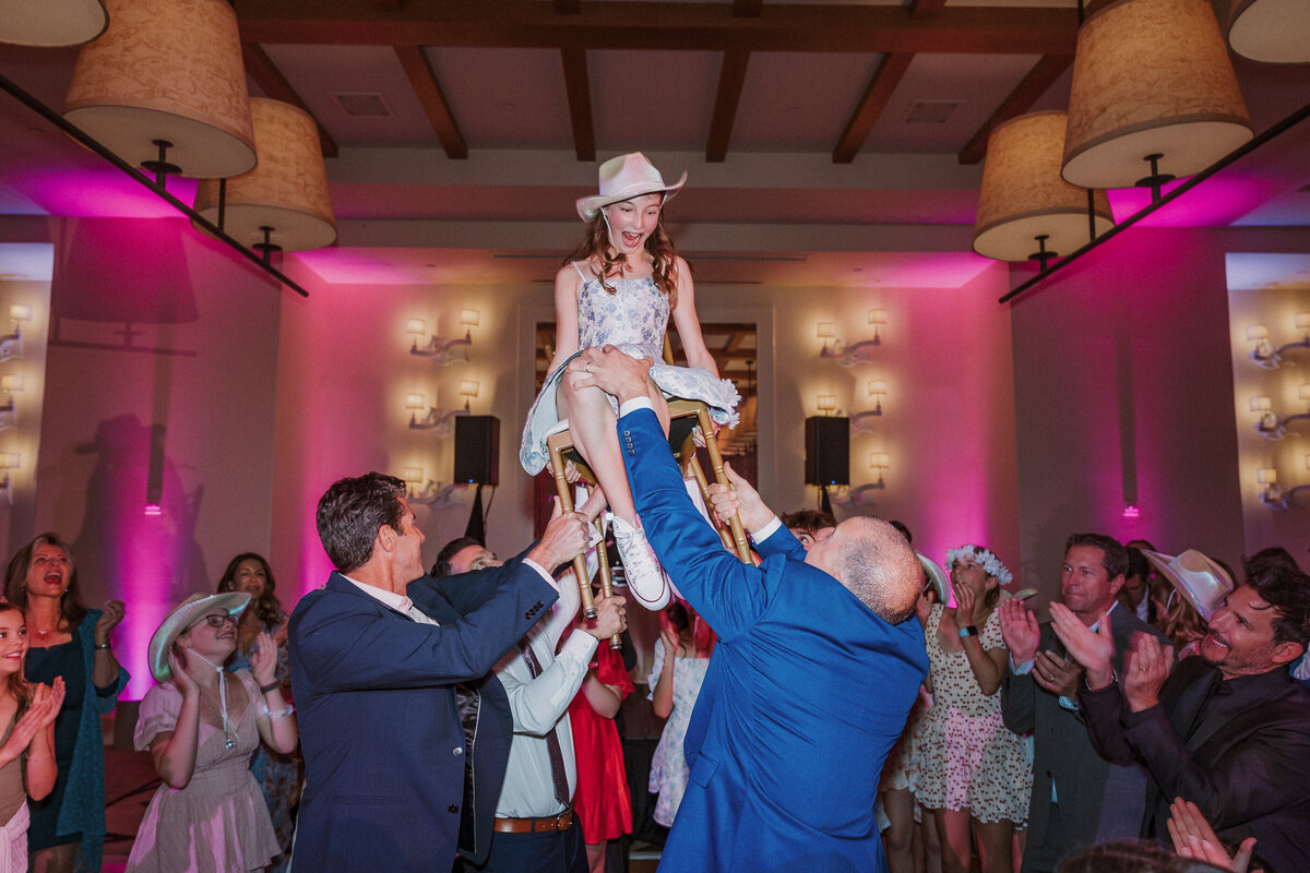 Southern California Bat MItzvah at Terranea Resort.  Pink cowgirl theme.  Chair lifting moment, Hora.