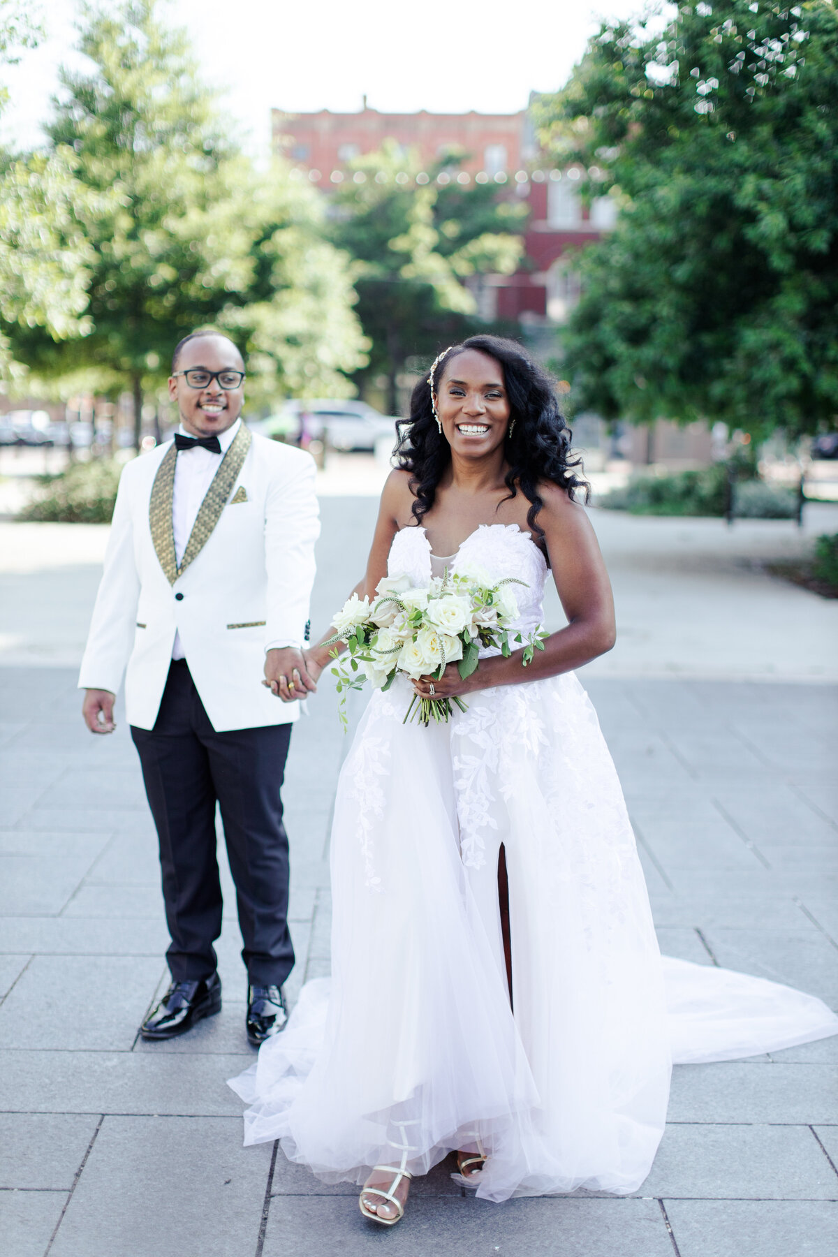 DebbieEkoPhotography_JoshJustina_MainStreetStationWeddingCouple-125