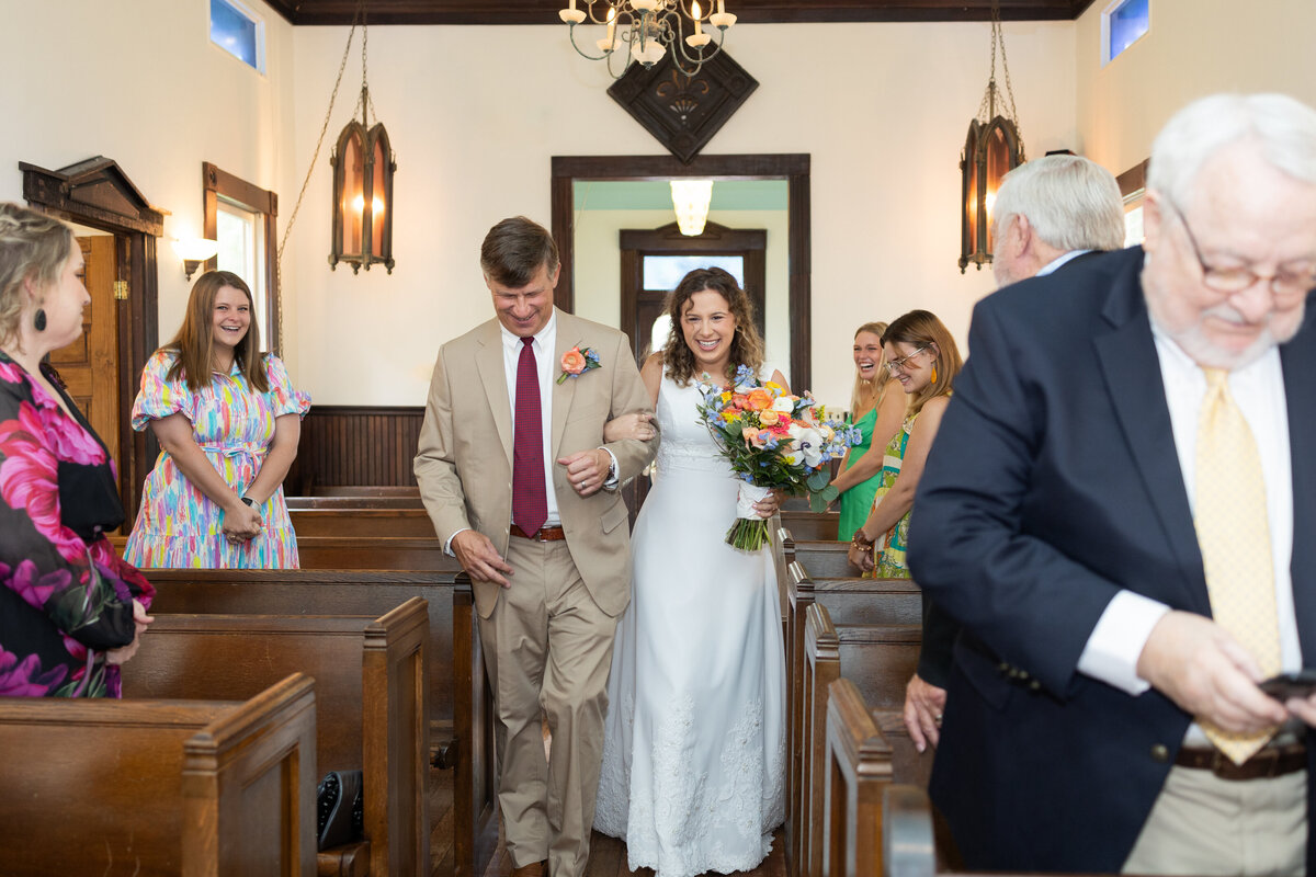 lake-pines-event-center-georgia-bride-walking-down-the-aisle